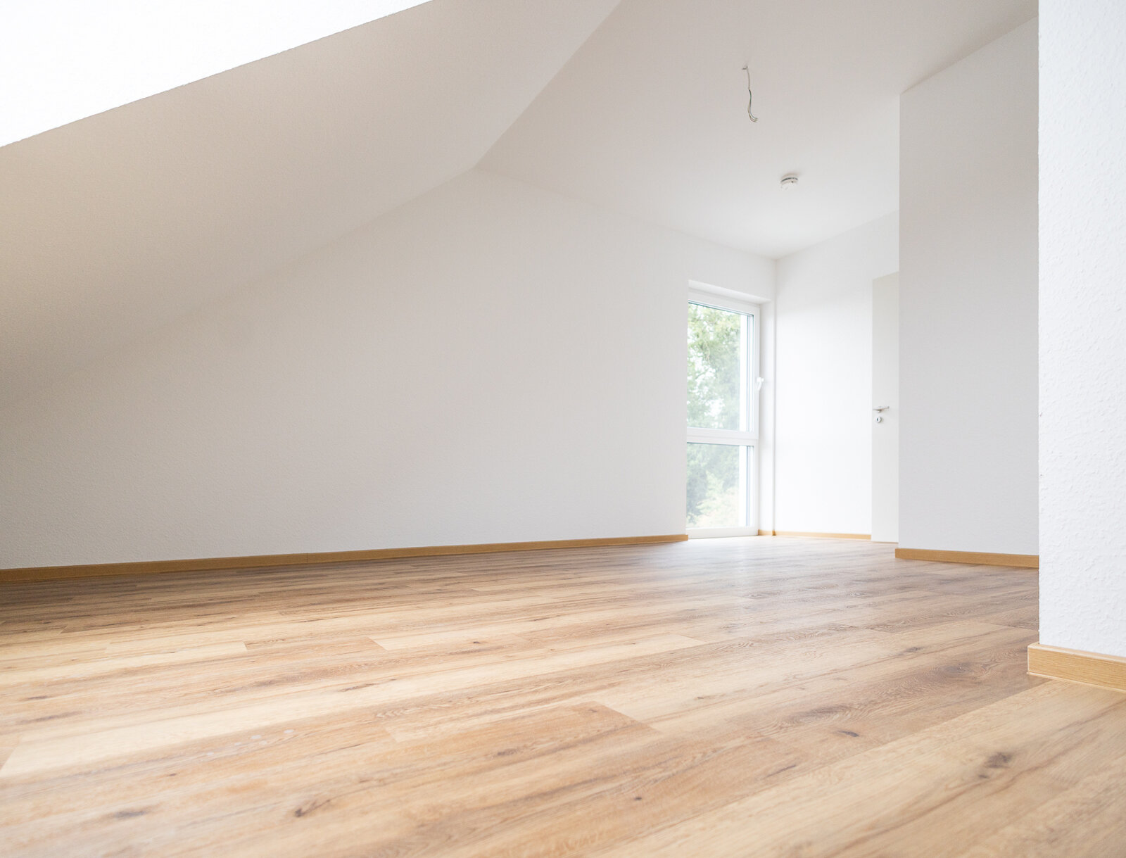 Zimmer im 2. Oberschgeschoss mit Dachschrägen